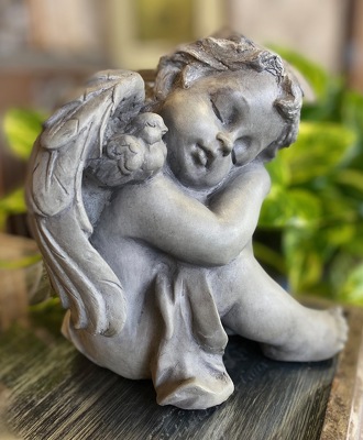 Sleeping Resin Cherub from In Full Bloom in Farmingdale, NY